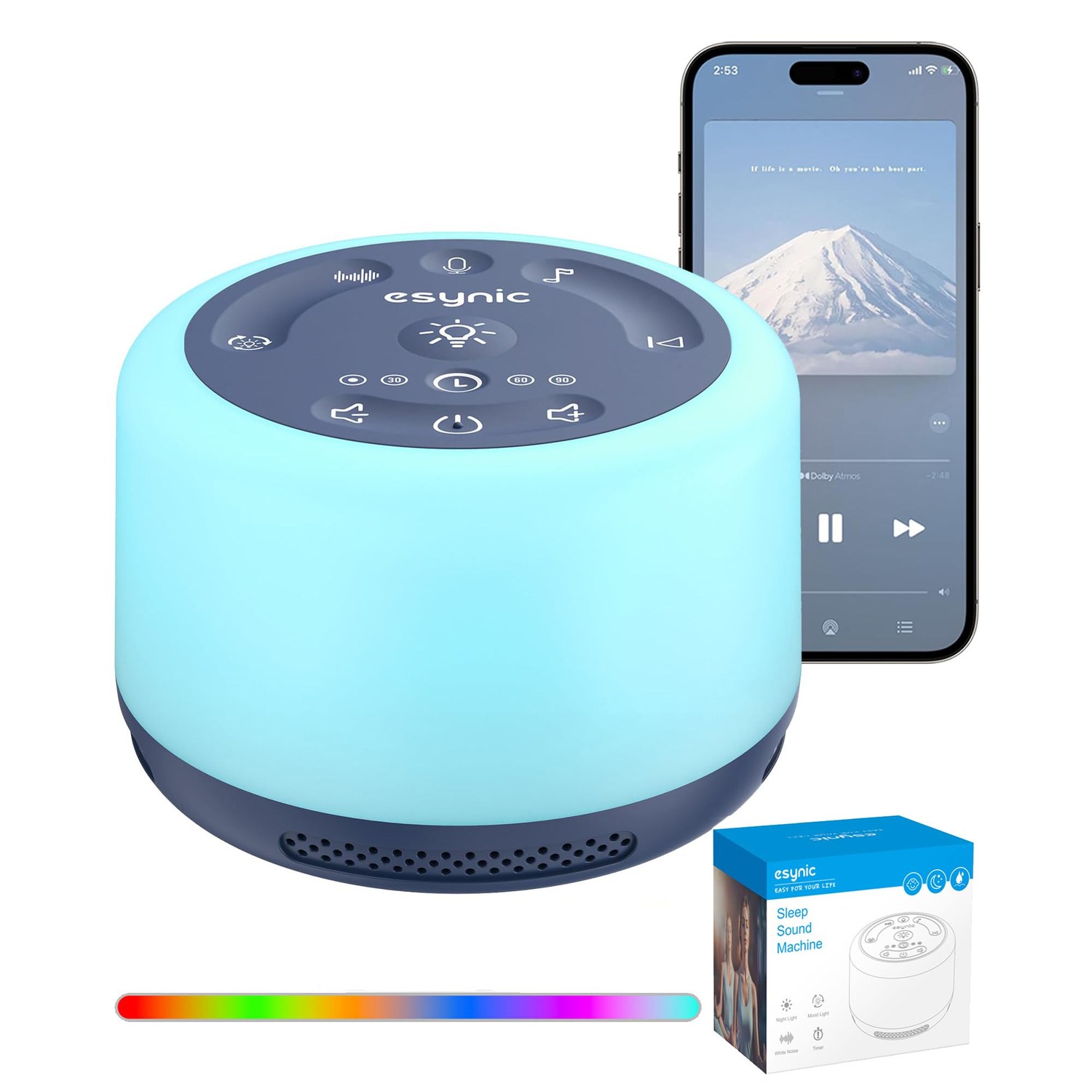 eSynic white noise machine showing its backlit button layout in a dark room