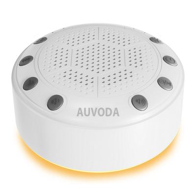 Auvoda S318 white noise machine glowing with its 11-colour LED light